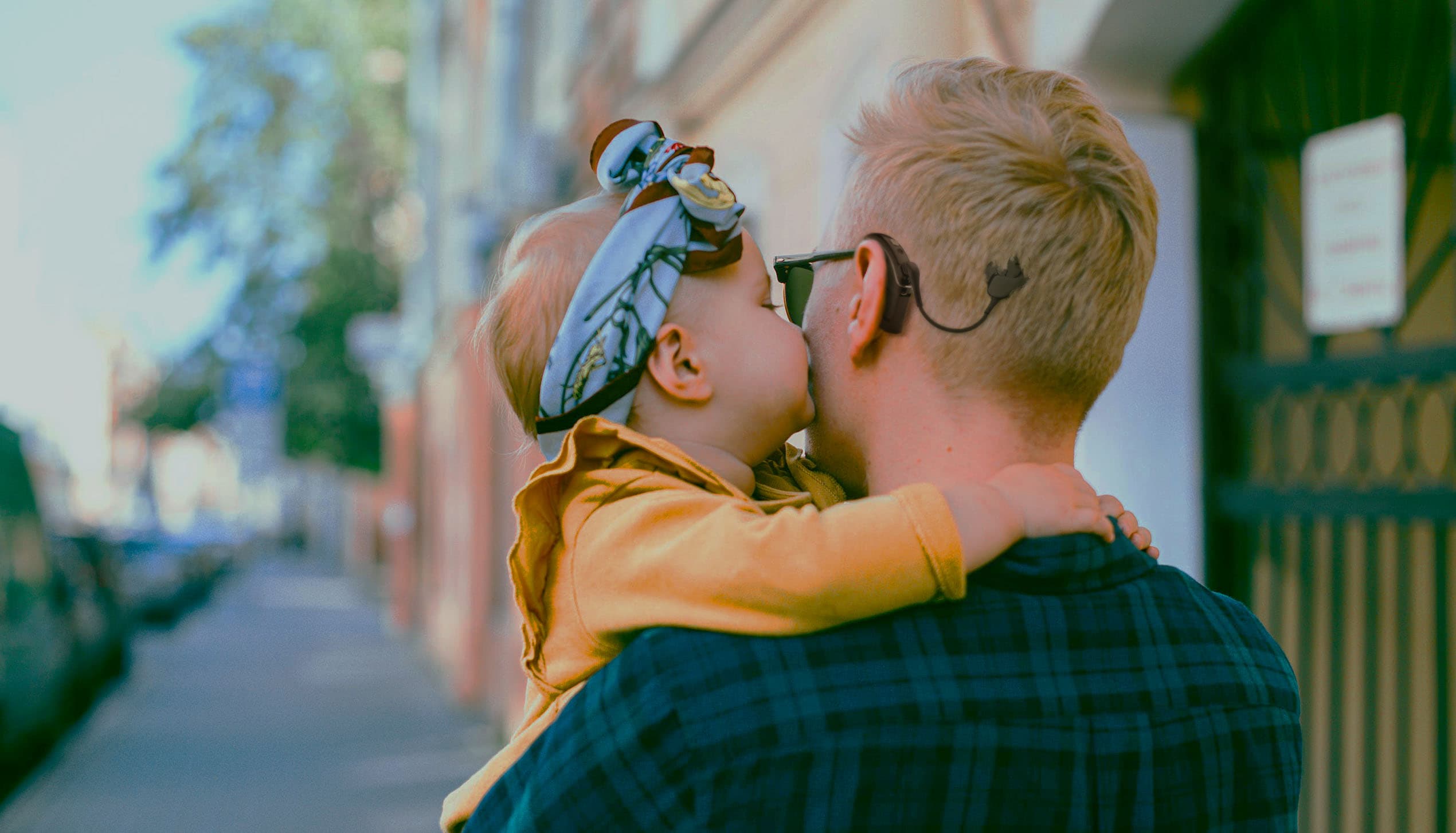 Parent holding child in a warm embrace